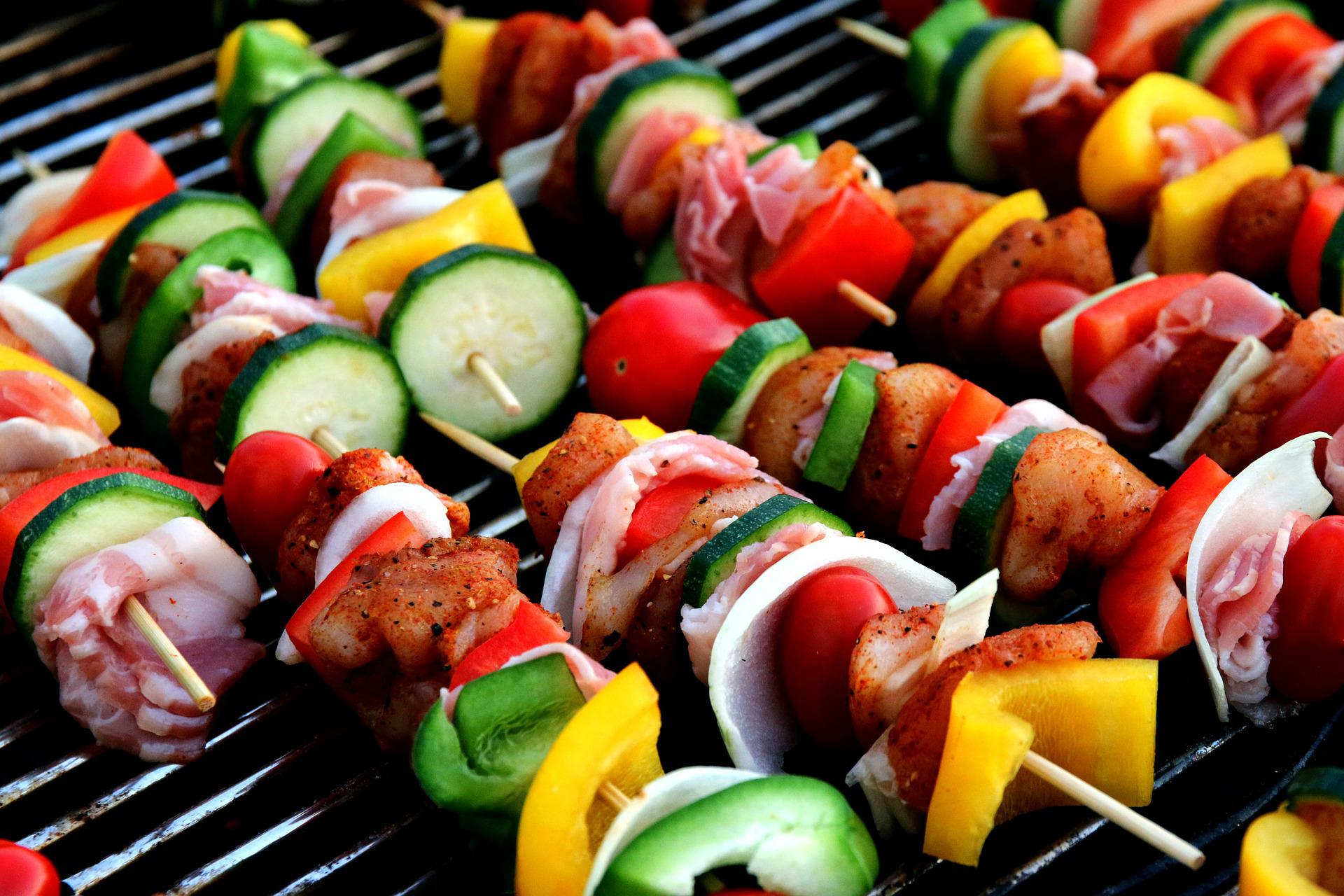 veggie and meat shis kebab on a grill